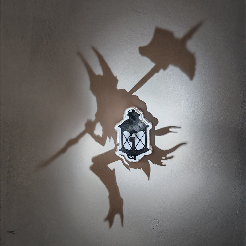 Fantasy warrior lantern shadow projection lamp with a huge armed horned silhouette on the wall and central black lantern design