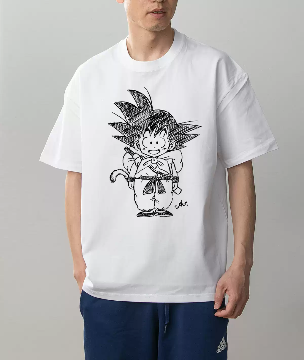 Kid Goku Dragon Ball white cotton T-shirt on model, front view showing black manga sketch print